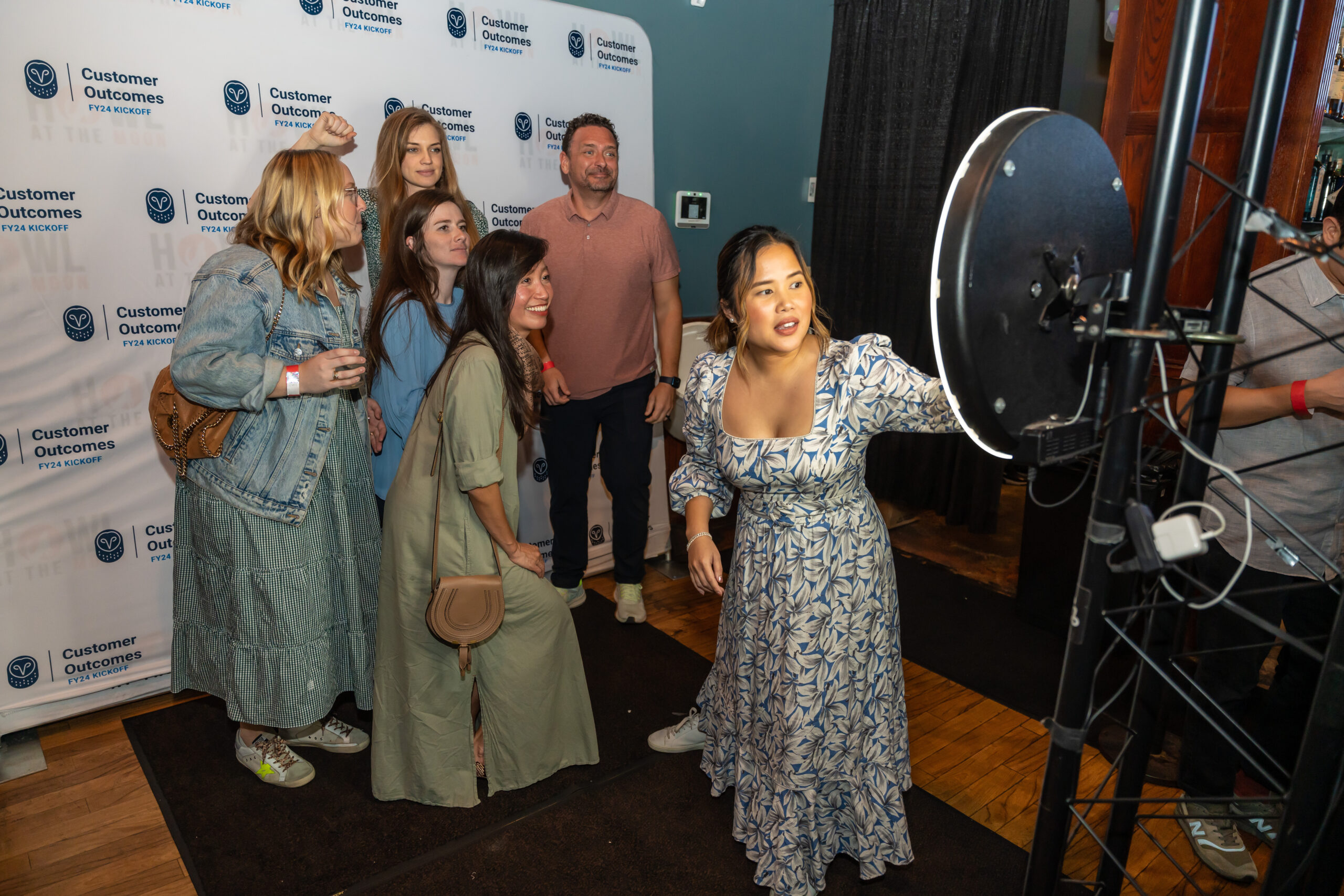 employees taking pictures at company event