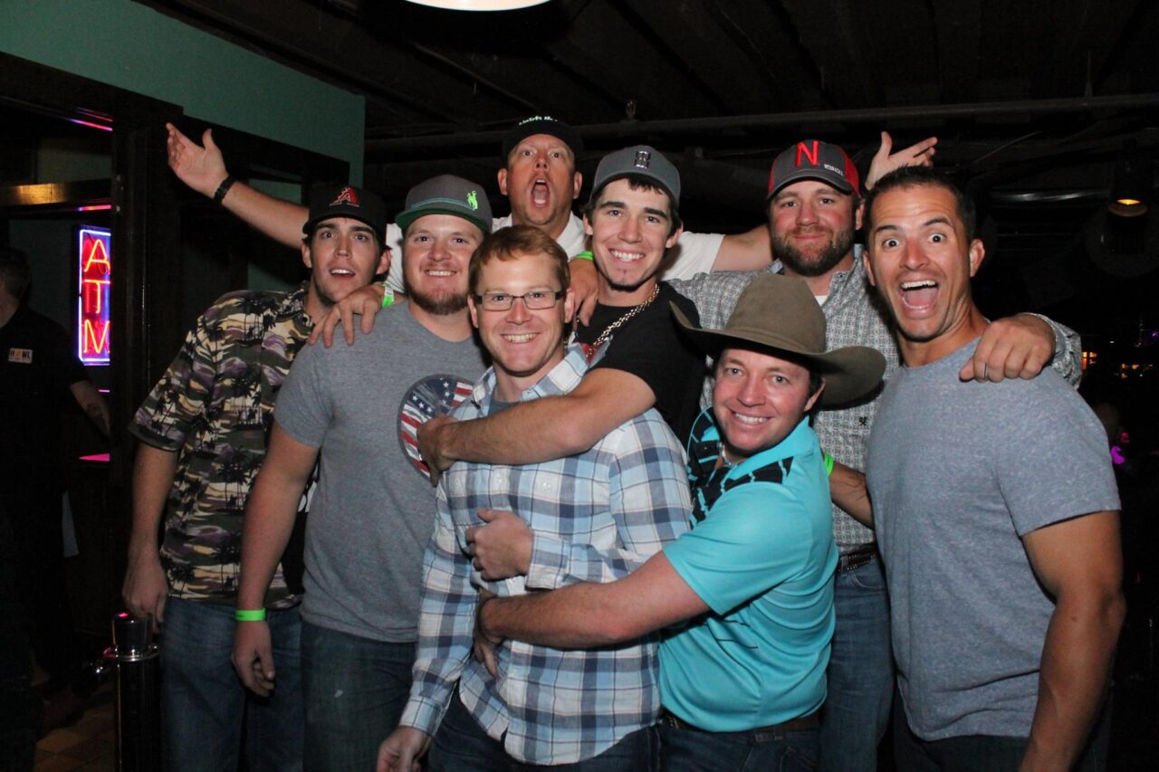 Group of men celebrating together