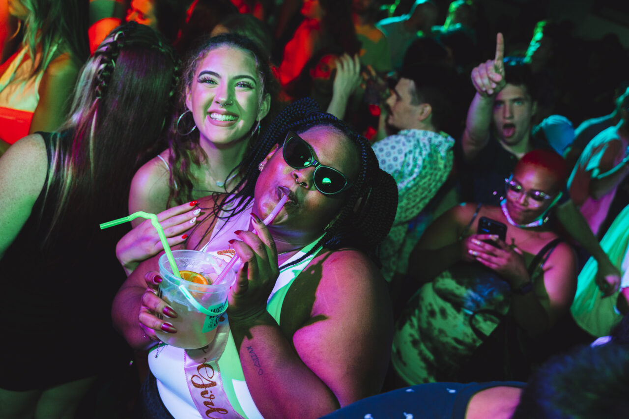 picture of a girl enjoying a cocktail on her birthday