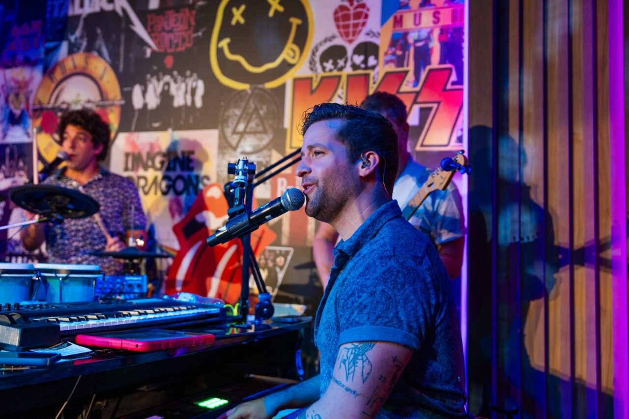 Male performer on stage at private party