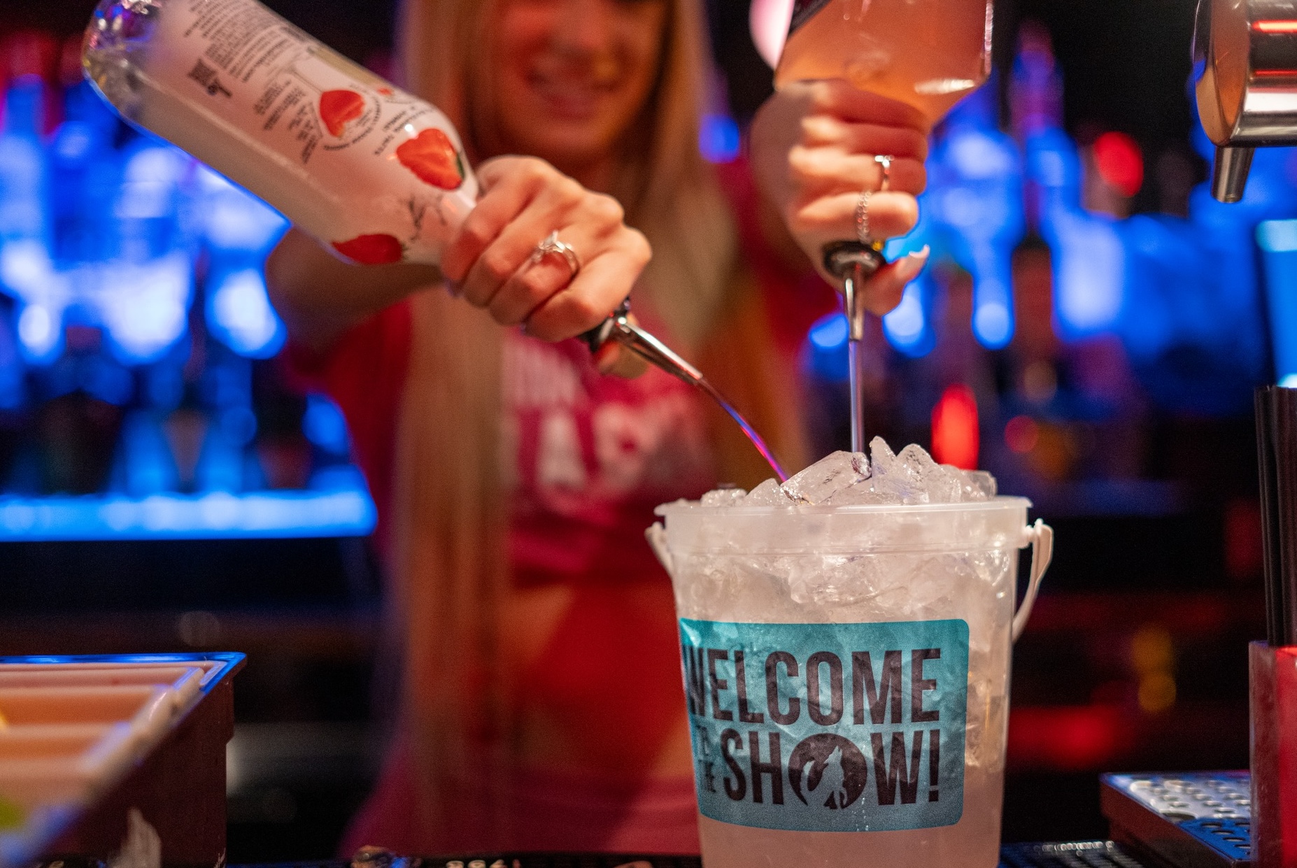 Bartender making a bucket cocktail