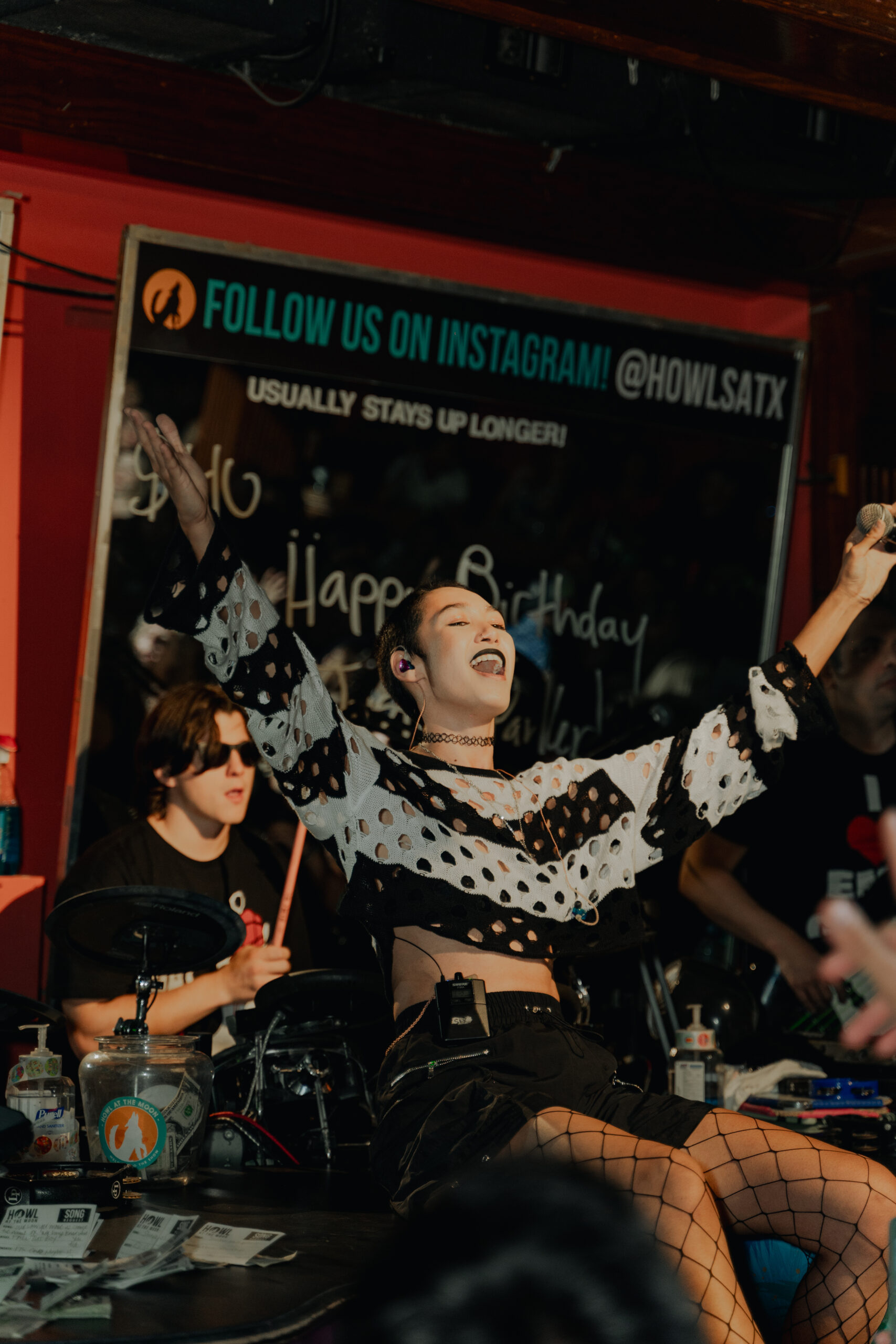 Entertainer singing at emo night promotion