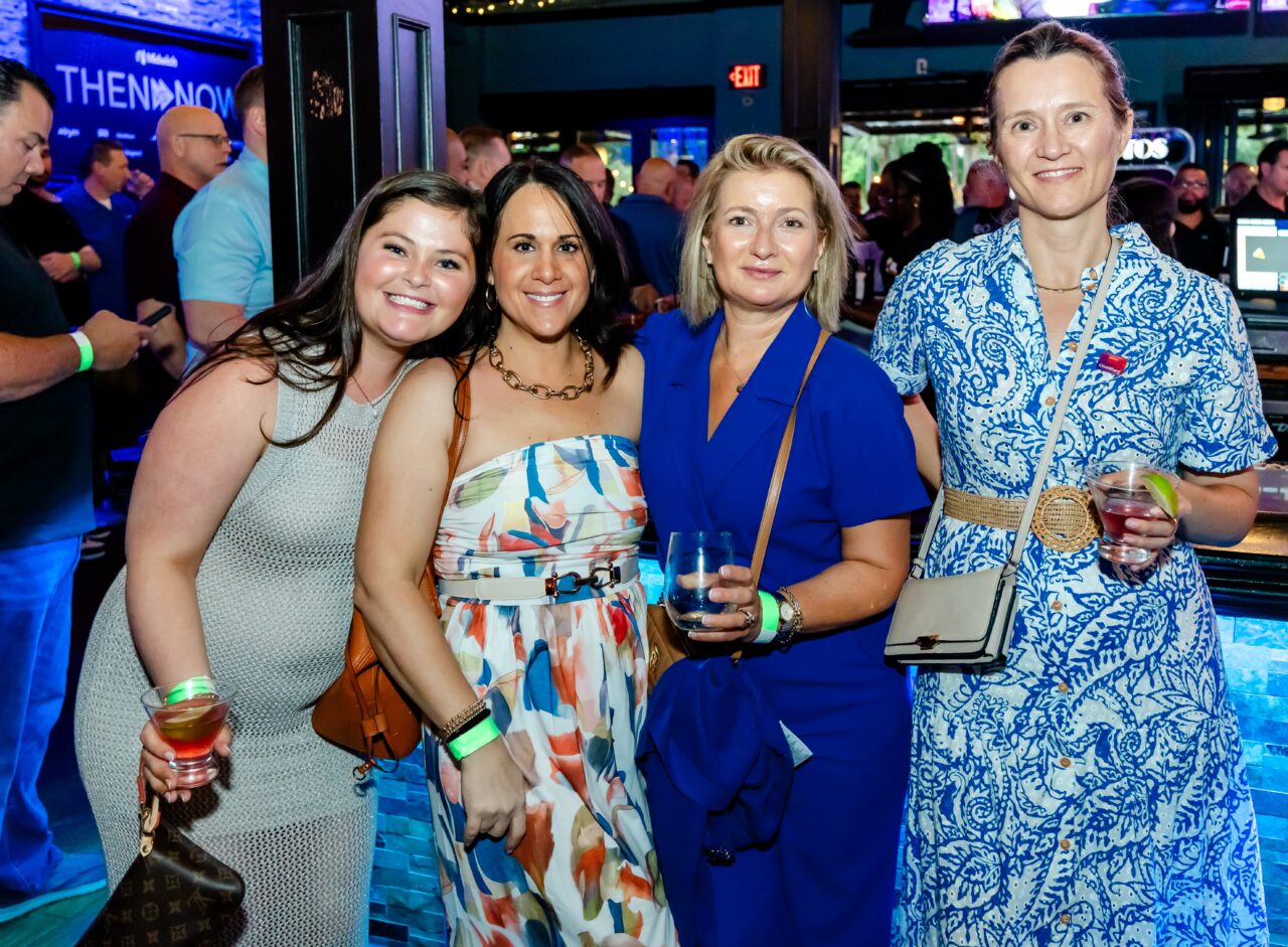 Group of women enjoying Orlando Happy Hour at Howl at the Moon.